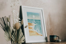 Load image into Gallery viewer, &#39;Morning Reflections&#39; sea shore limited edition fine art print in white frame against neutral wall
